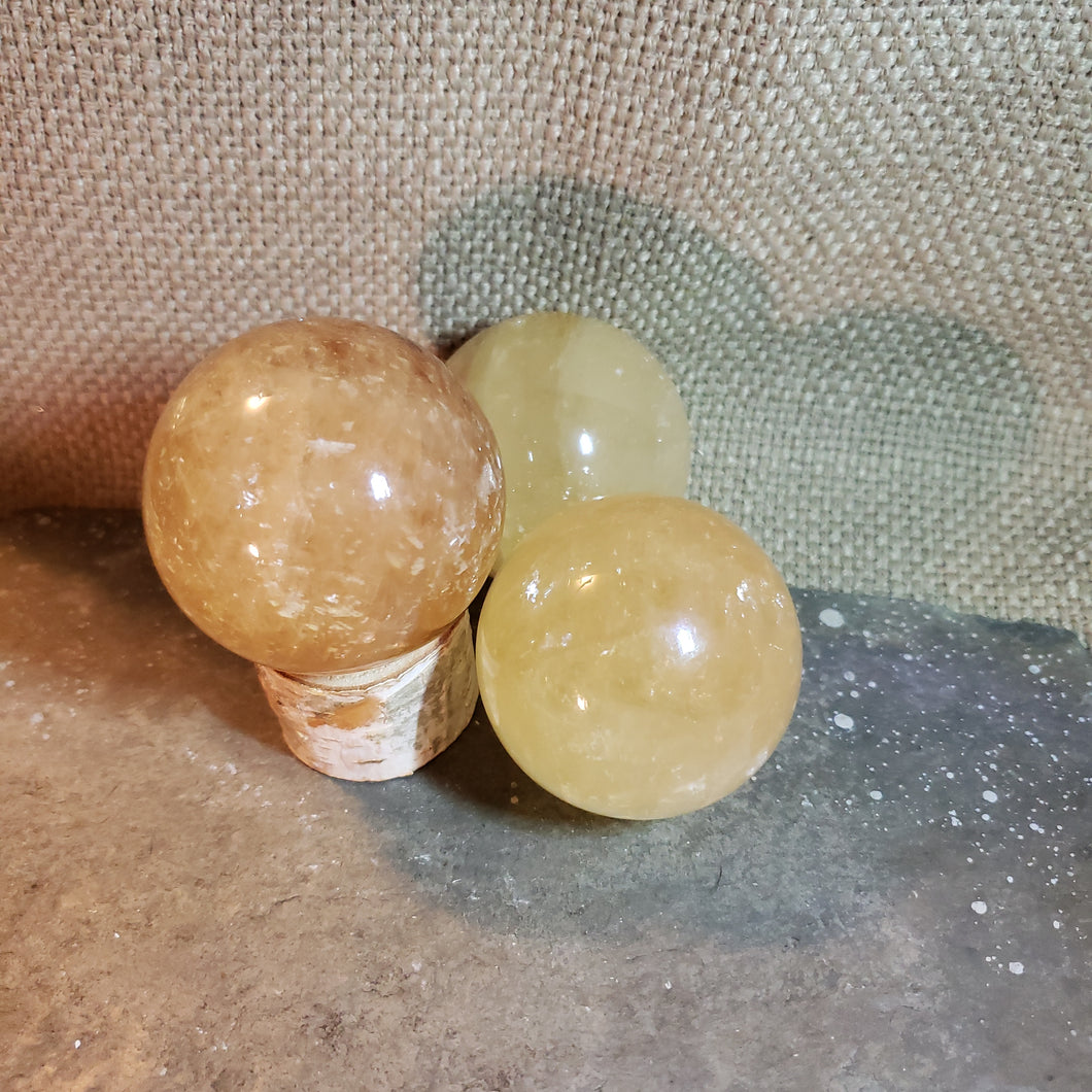 Honey calcite sphere