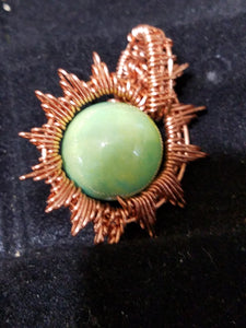 Sunburst pendant with ceramic bead