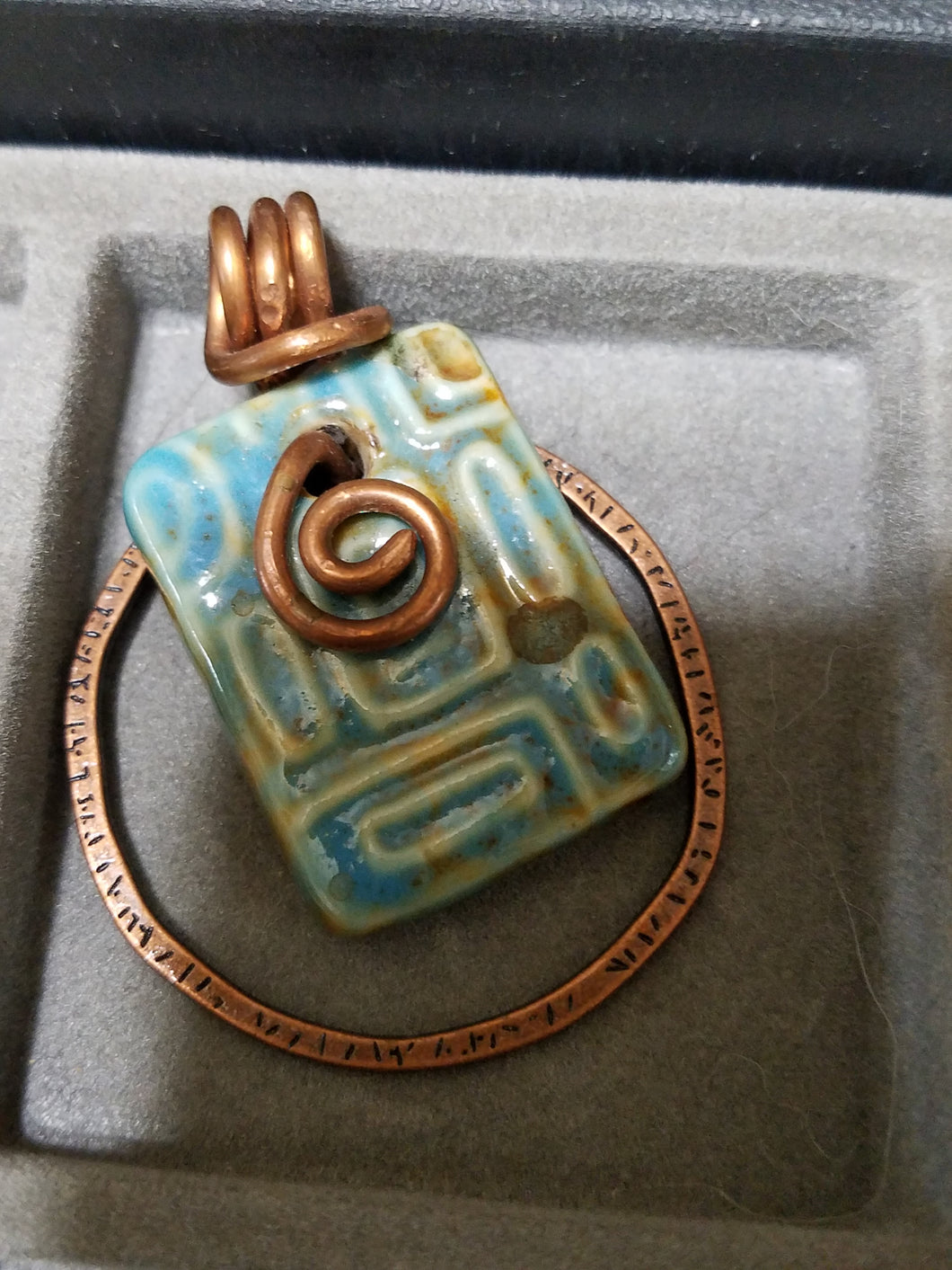Ceramic pendant with wire bail